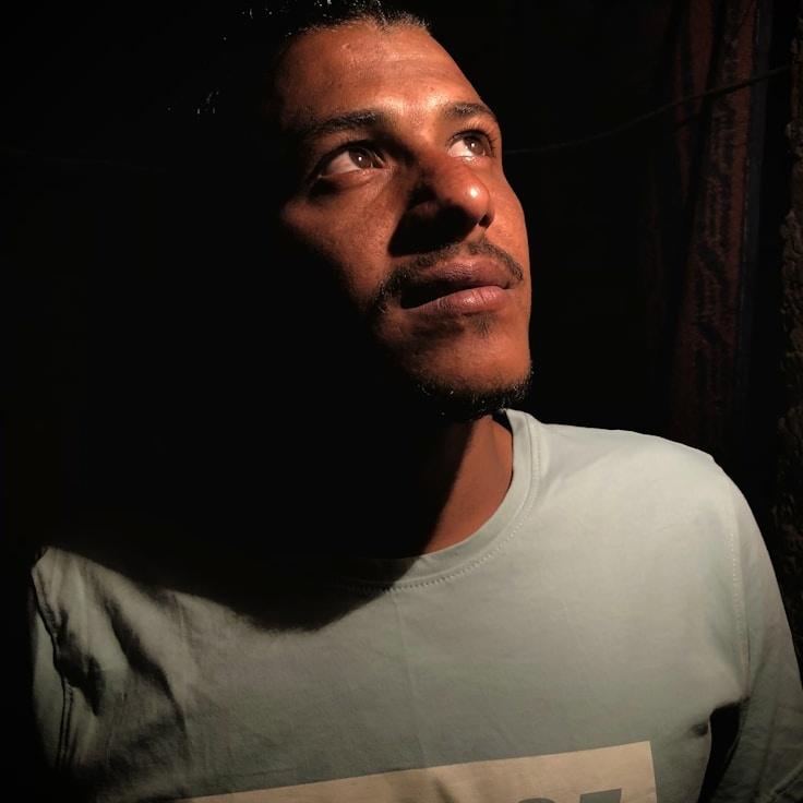 Kaveri Mehta, Lead Design Curator at PearlQuietStream, reviewing corporate floral arrangements